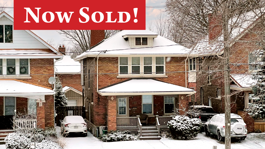 now sold banner on brick character home at 197 sugarloaf st port colborne for sale by frank ruzycki real estate