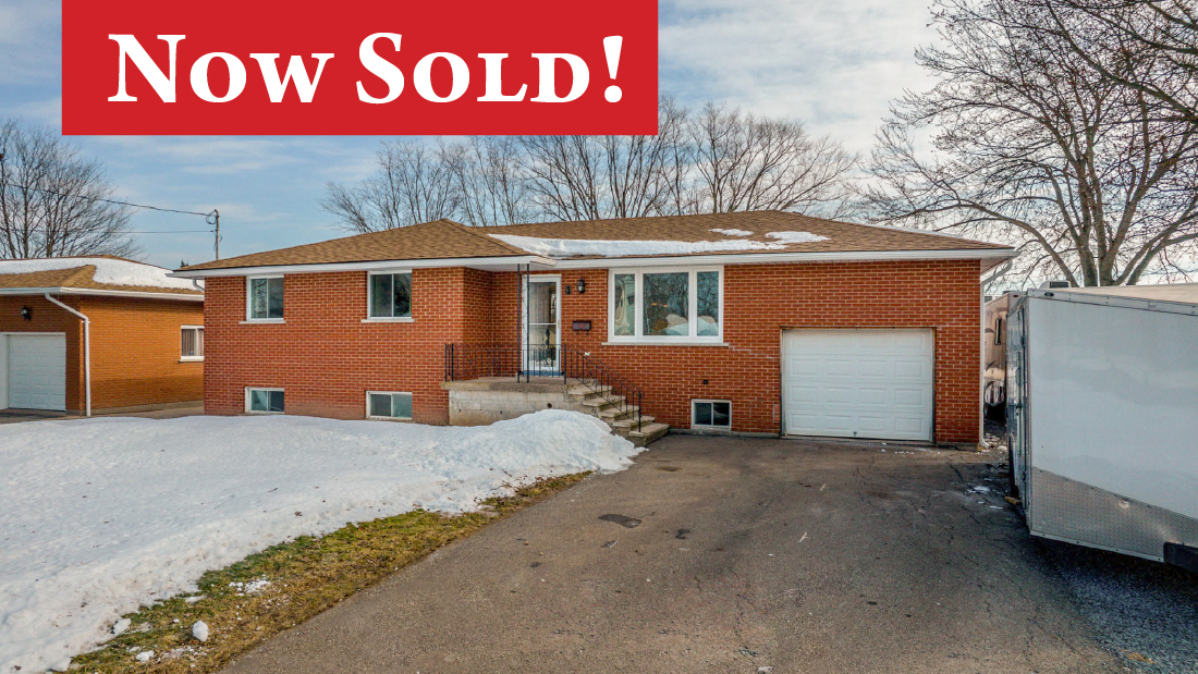 now sold banner on bungalow for sale by ruzycki real estate